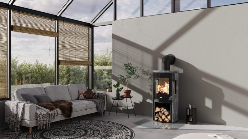 Braskamin HETA Icon-Line Moderna i taljsten med sidoglas i modernt vardagsrum, effektiv vedkamin 6,2 kW